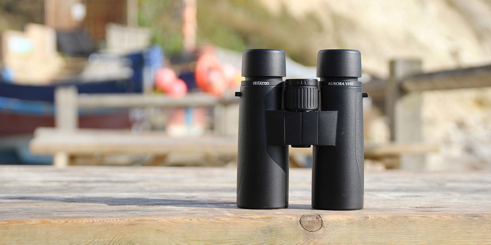 Opticron Aurora BGA VHD binoculars on a table