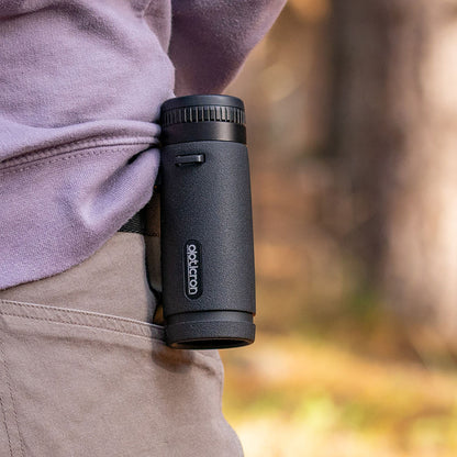 Opticron Trailfinder HD Monocular attached to a belt
